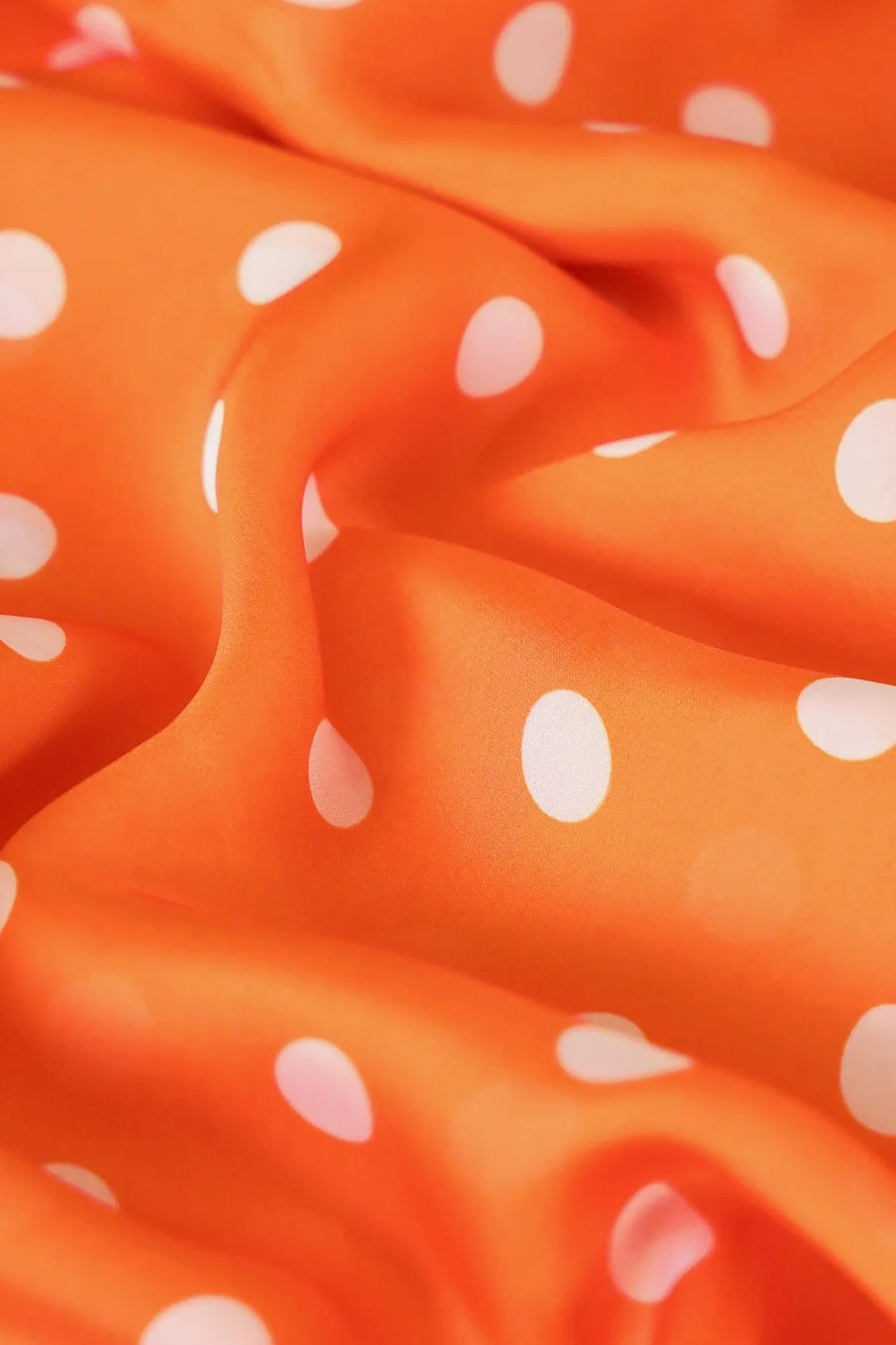 Orange And White Polka Dots Pattern Digital Print On Georgette Satin Fabric